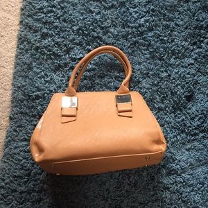 Ivanka Trump handbag. Slight wear. 9” by 12”.